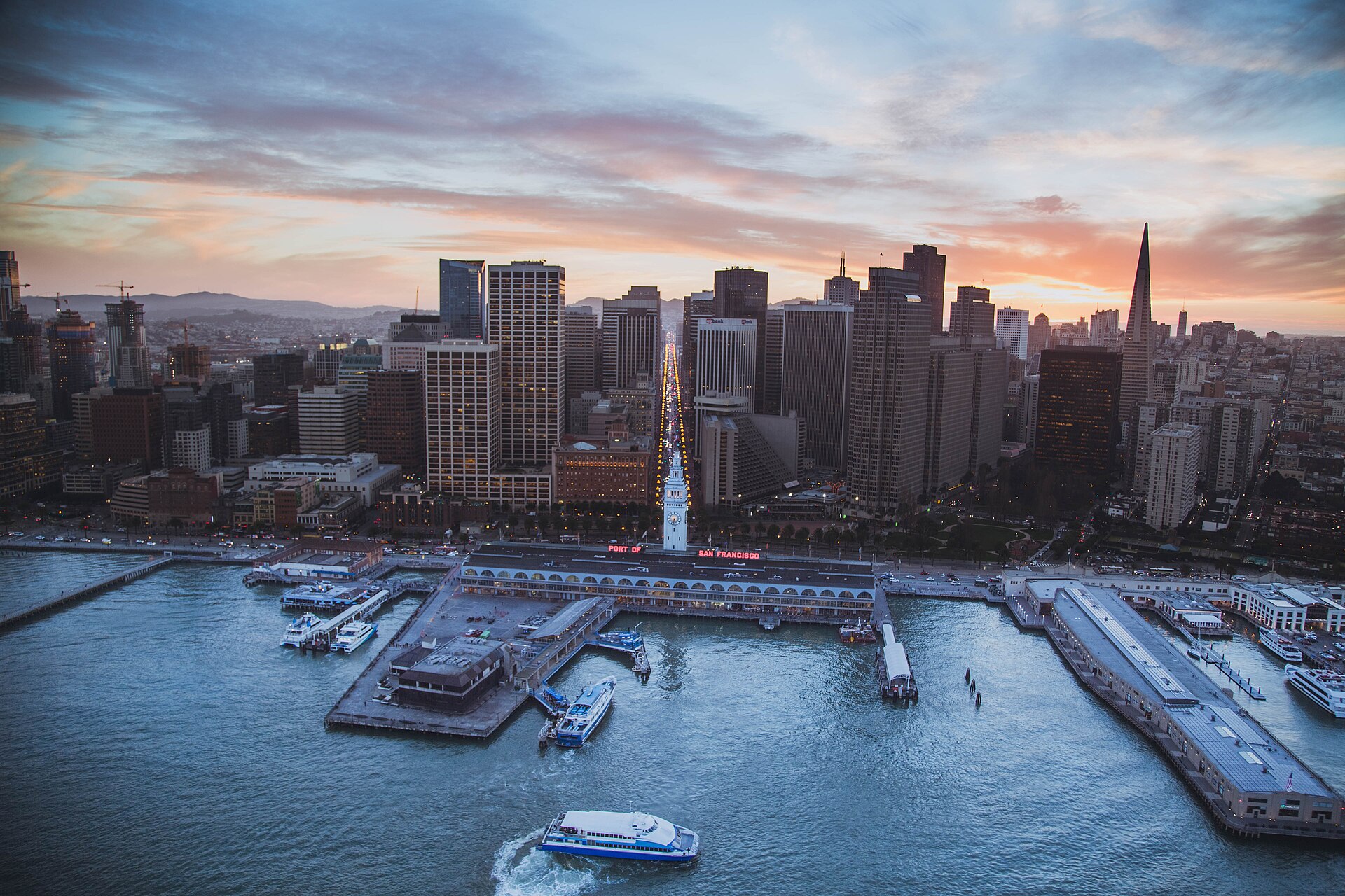 San Francisco's waterfront piers and downtown skyline at sunset